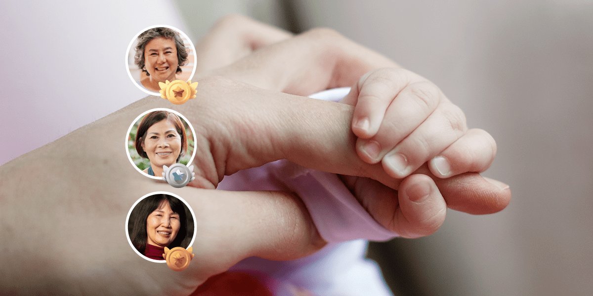 Newborn holding the finger of a Confinement Nanny